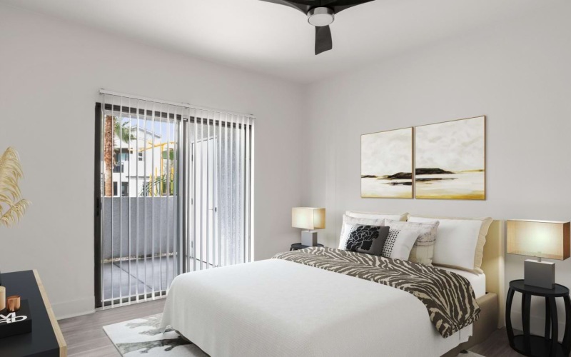 a bedroom with a fan and a bed