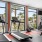 a room with treadmills and windows