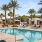 a pool with chairs around it