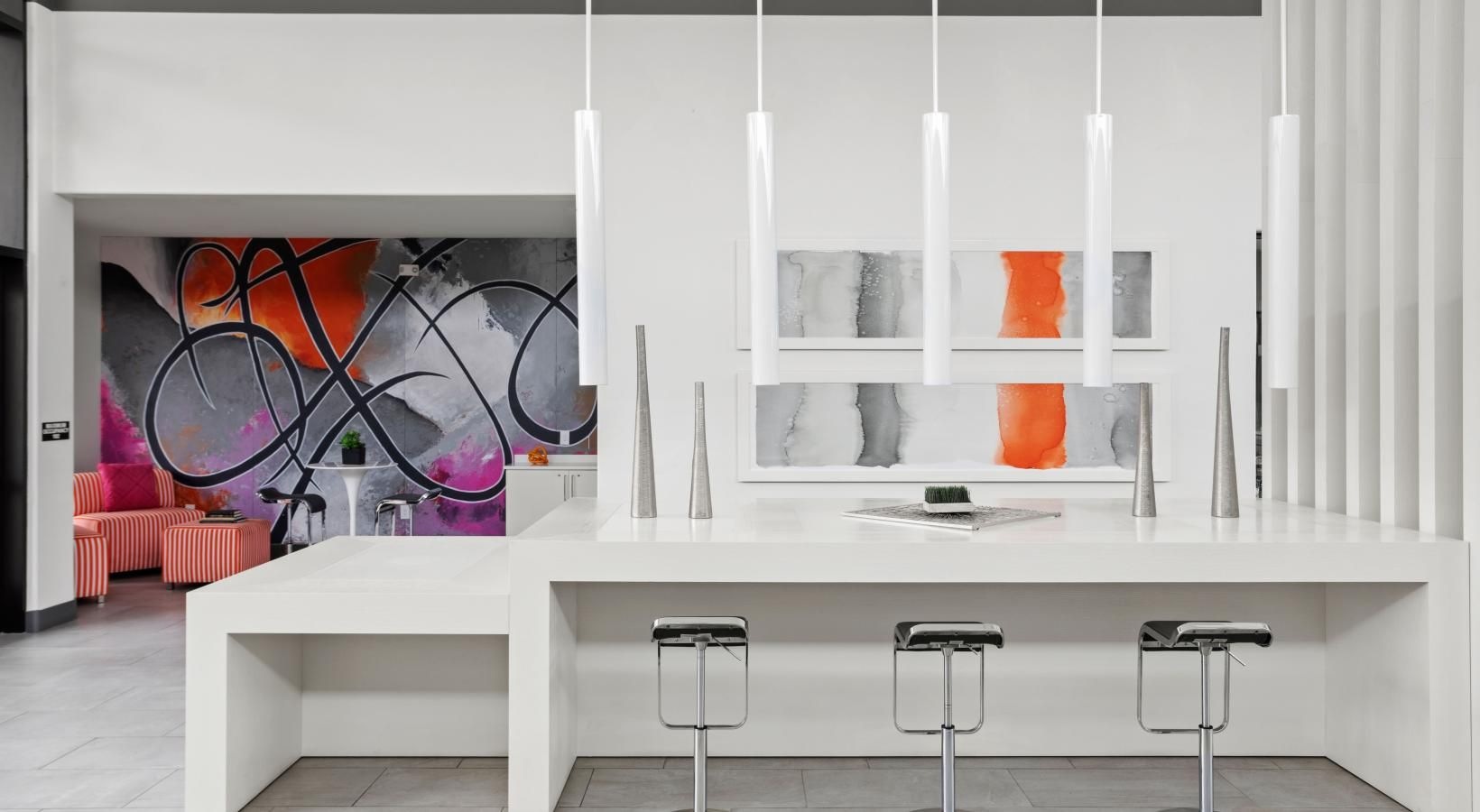 Take advantage of all Trend! has to offer a white table with stools and a white table with a white wall with a window and a