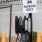 a parking meter is stationed on the side of a road